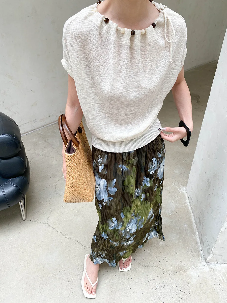 Sommerlicher Damenrock mit elastischem Bund, plissierter Textur, Retro-Print und geradem Schnitt – Detail 6