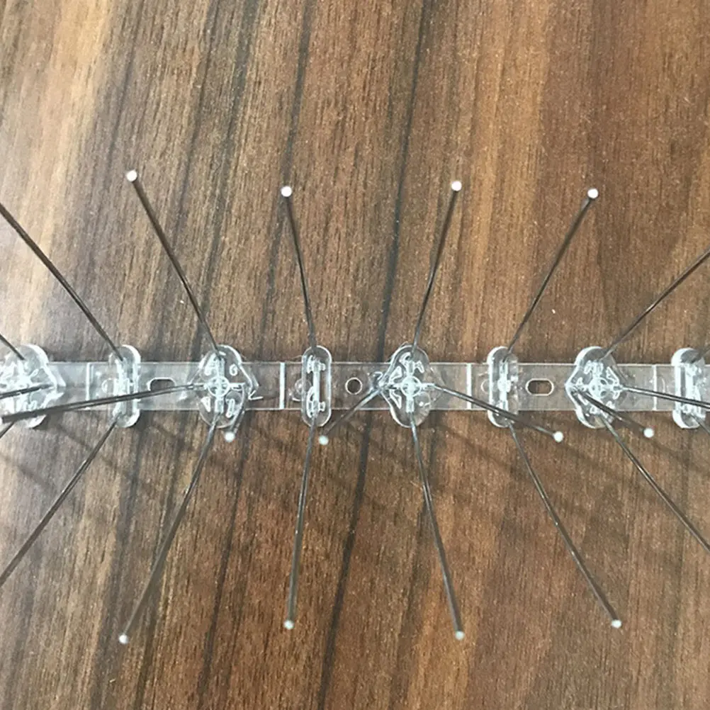 

2Pcs Anti Bird Thorn Guard Spikes Board Repellent Fence for Pigeons Prevention Tool High Density Stainless Steel PC Plastic Base