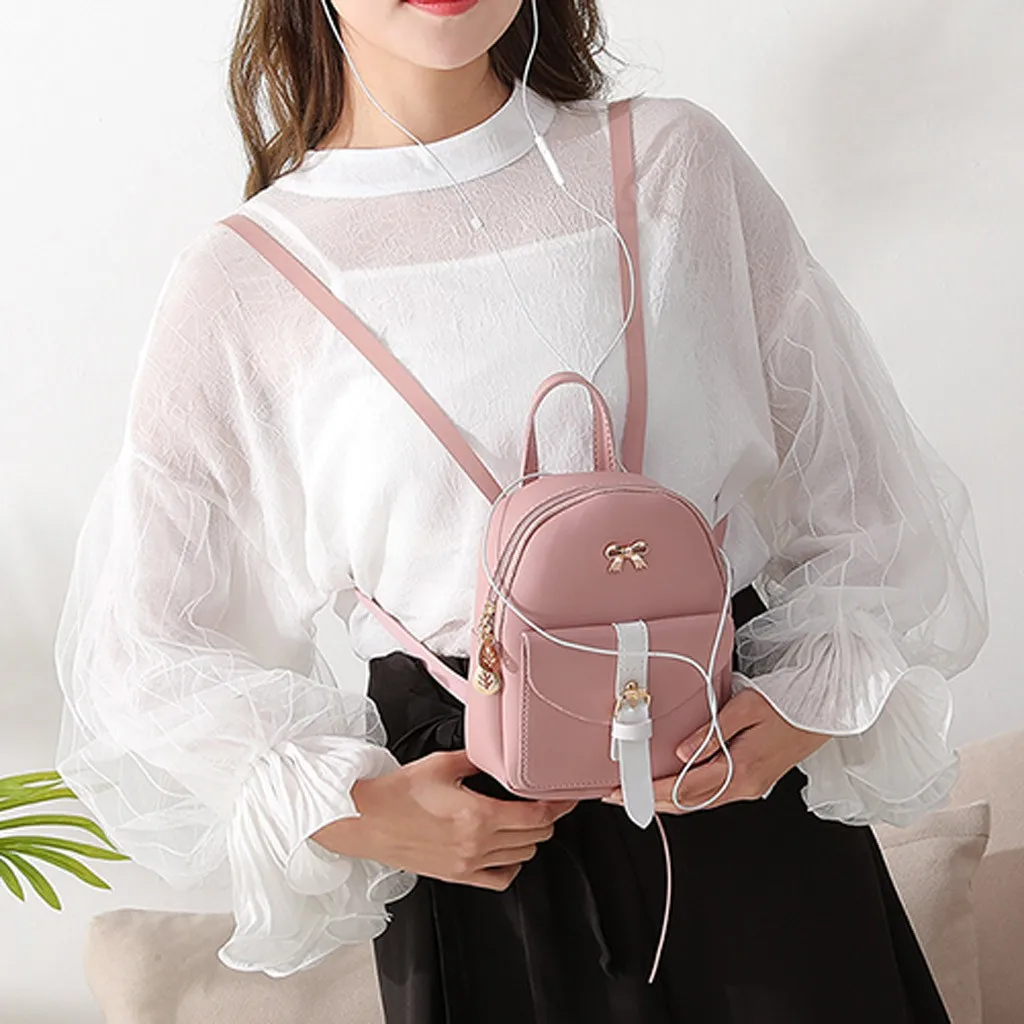 Mini mochila de piel sintética para mujer, bolso con cremallera de hoja hueca con logotipo de lazo, mochila Kawaii para niña, bolso escolar pequeño