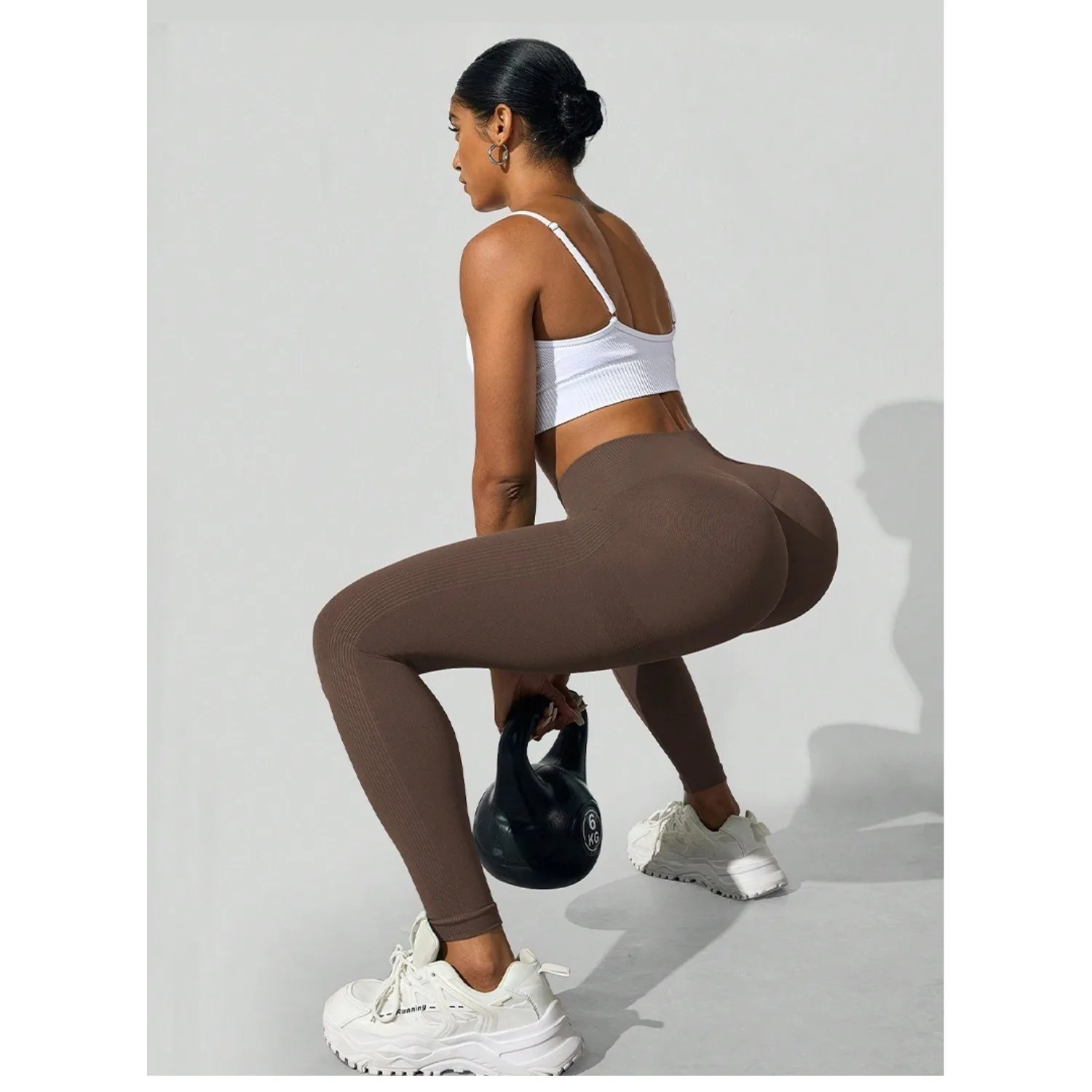 Damskie dzianinowe bezszwowe spodnie do jogi z wysokim stanem, modelujące pośladki, elastyczne, obcisłe legginsy do jogi i fitnessu.