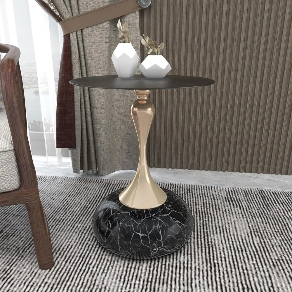 Glossy base and contrast gold pedestal stem on Muji Style Stainless Steel Round Accent Table for compact reading nooks