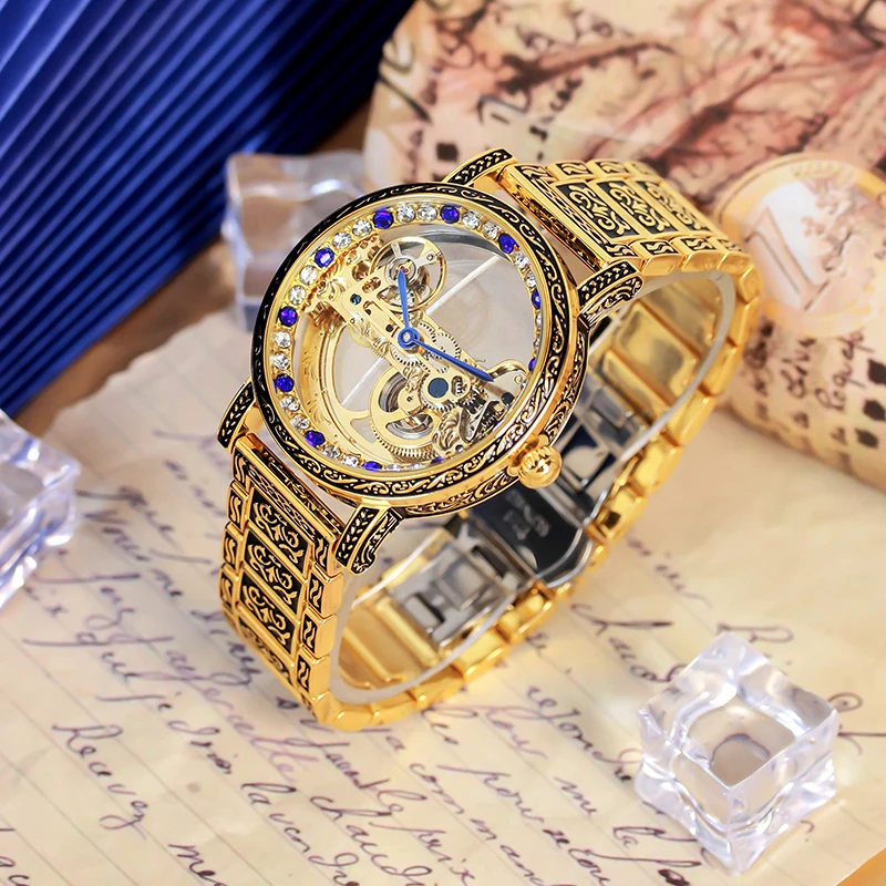 A men's black and gold steel band retro style double-sided hollow single bridge fully automatic mechanical watch.