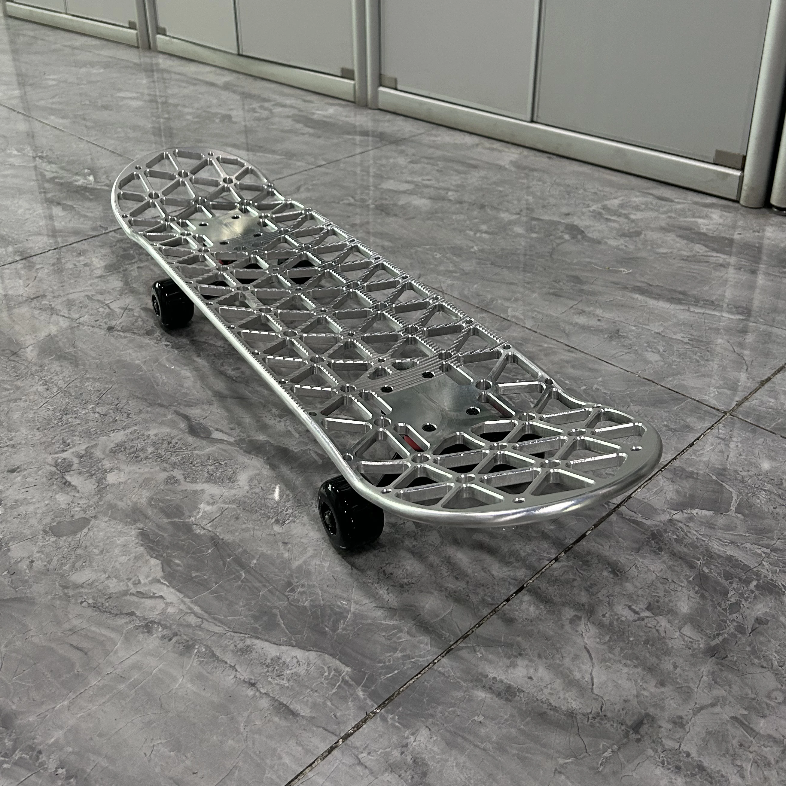 

Custom CNC Machined Skateboard CNC-Milled Isogrid 100% Aluminum Multiple Colors Longboard Deck