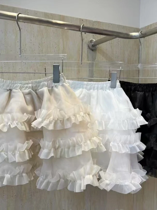 ربيع 2025 المرأة مرونة الخصر رقيق f تنورة كعكة ort تنورة السراويل أجراس خشبية عالية الخصر الحلو Sle ort طول