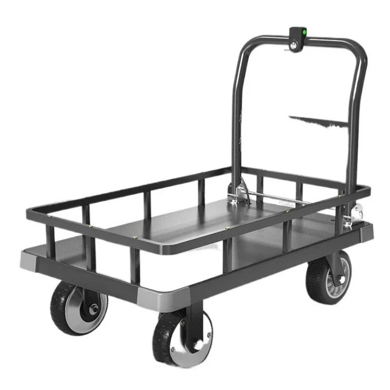 

Electric four-wheeled flatbed truck, trolley, construction site moving truck into the elevator,