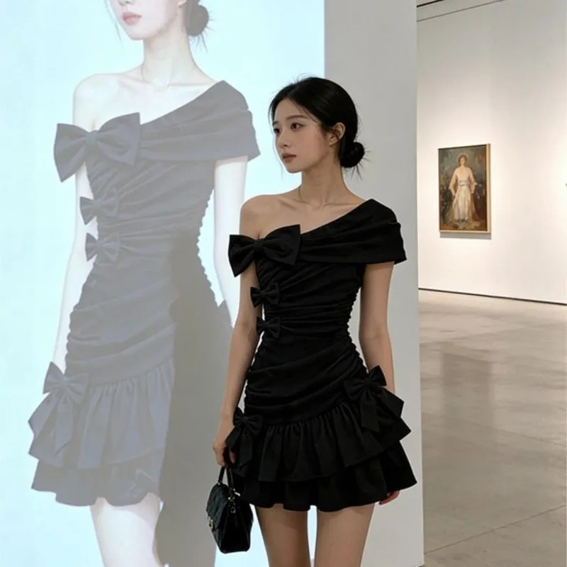 

A large-sized black off-the-shoulder elegant cinched-waist short skirt