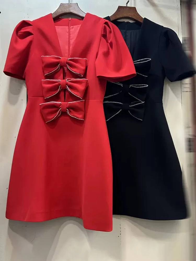 

Heavy solid color V-neck rhinestone bow vest skirt fashion mini A-skirt summer women's new temperament straight dress