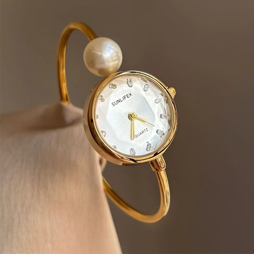 Minimally designed pearl Roman dial quartz women's watch with an open bracelet, Relogio Feminino Montre Femme watch
