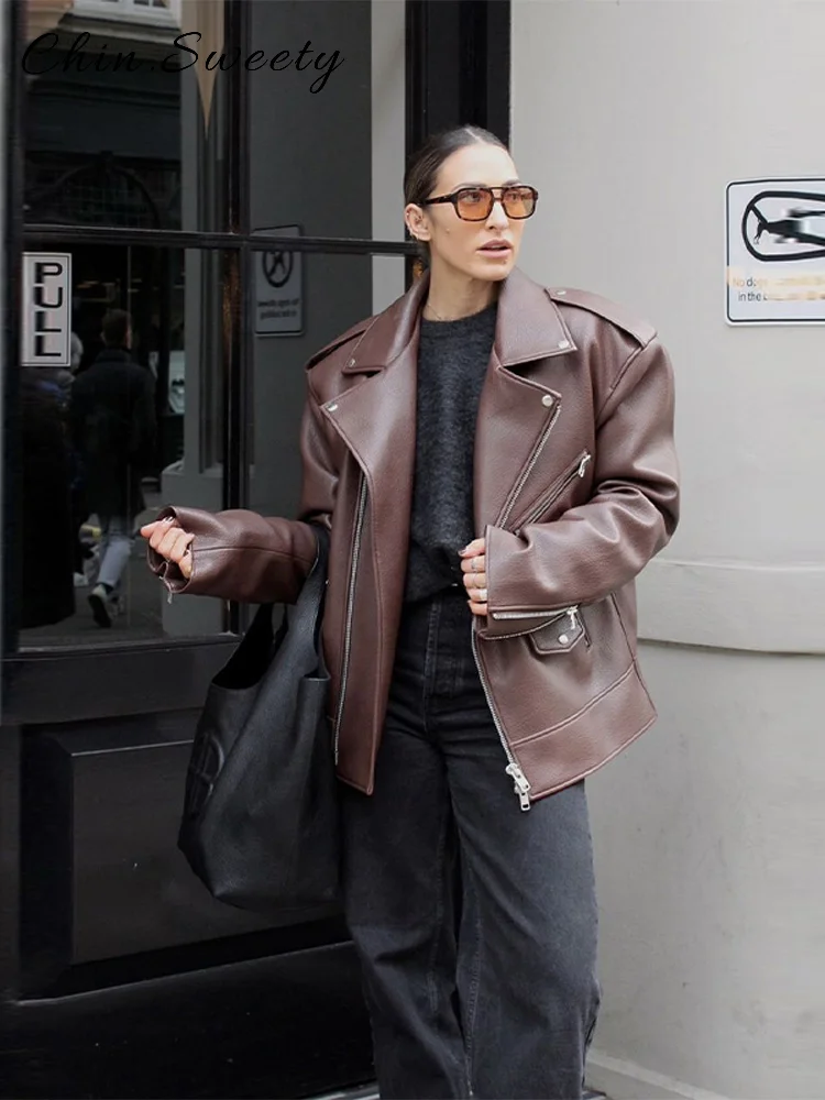 Chaqueta de cuero con cremalleras asimétricas para mujer, abrigo holgado con solapa lisa y bolsillos de manga larga, prendas de vestir elegantes para Otoño e Invierno 2025