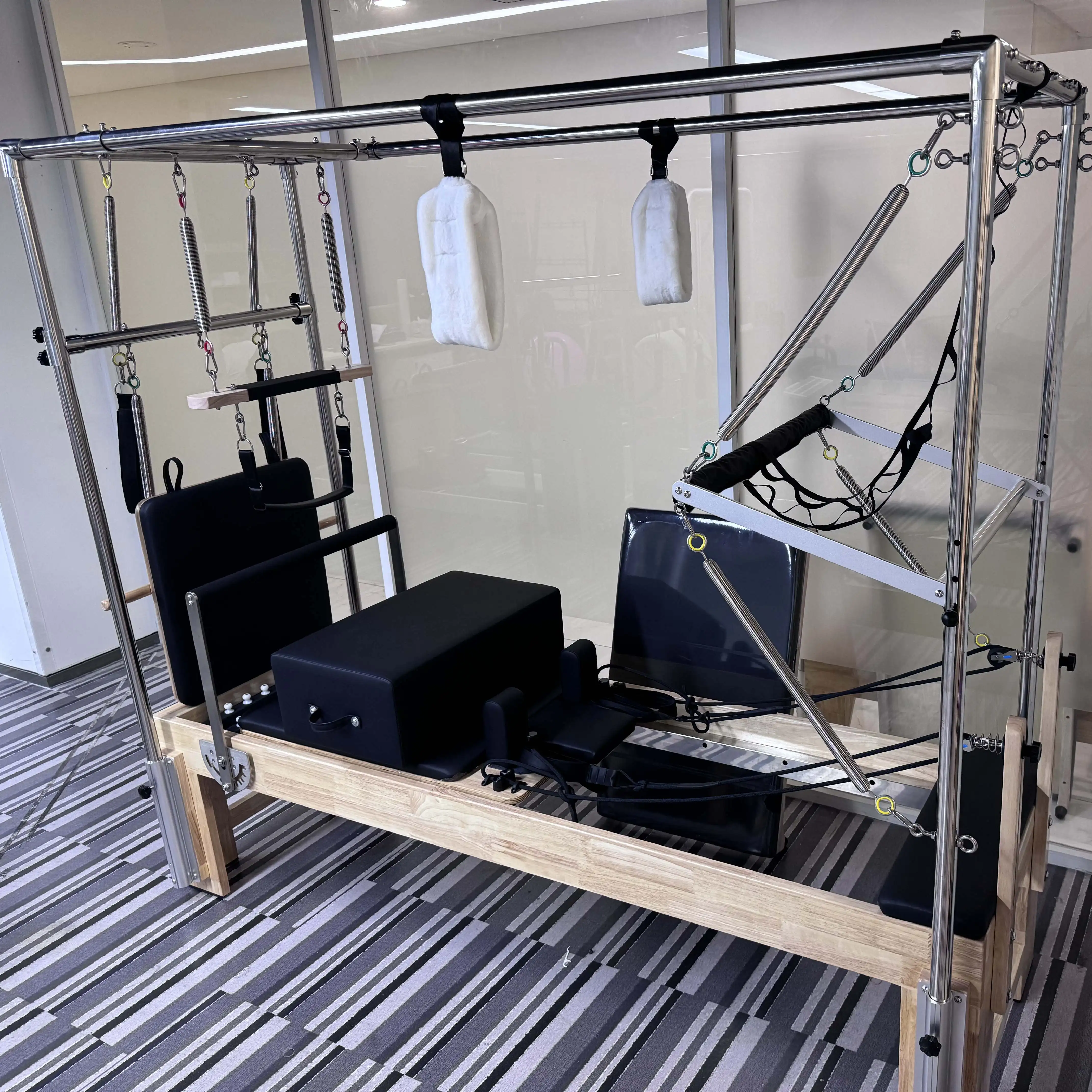 

Pilates shapeshifter Cadillac Tower sports three in one hanger sports Pilates shapeshifter