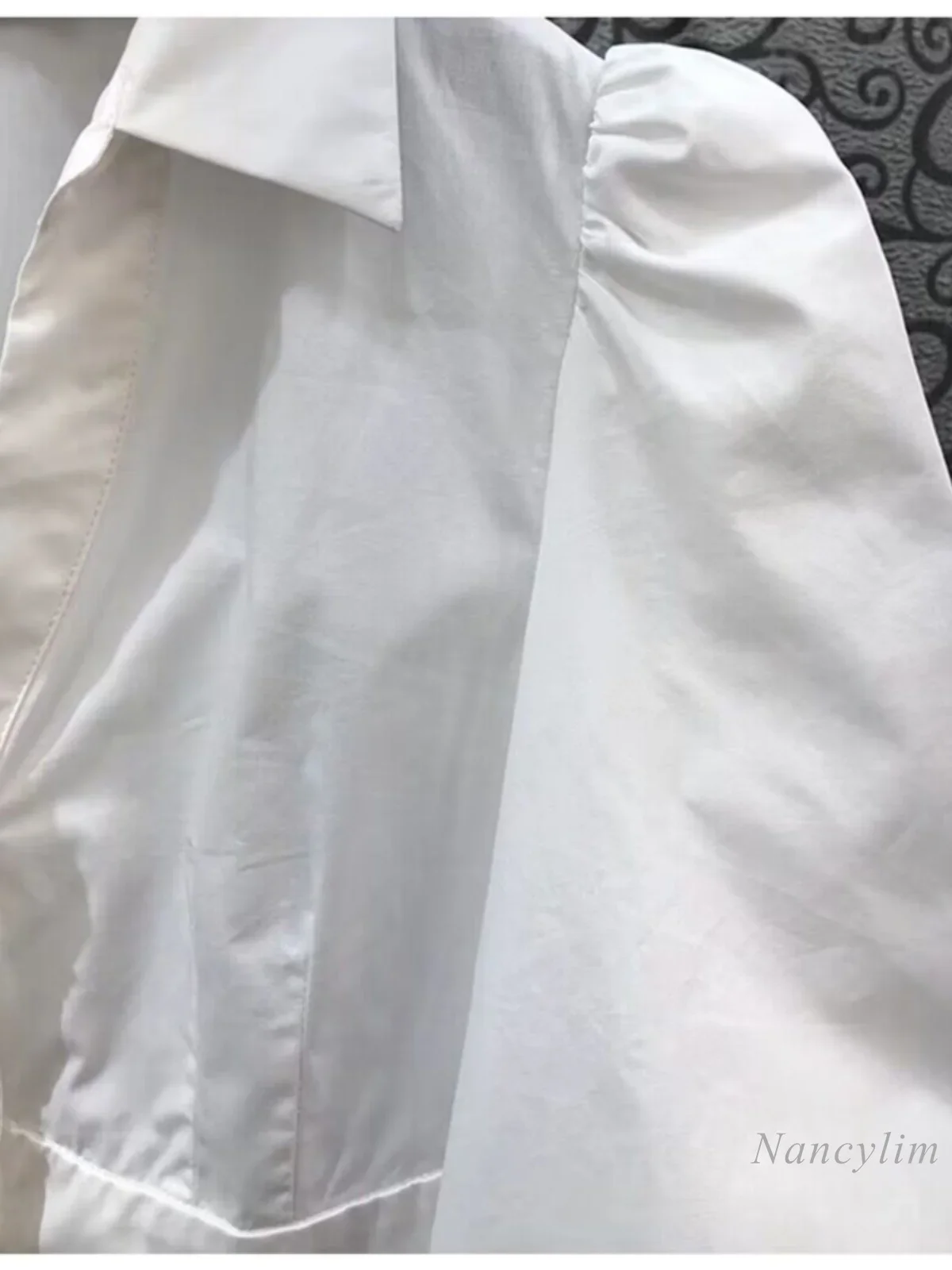 French Style Short Blouse Ladies Three-grain Diamond Buckle High-waisted Short Bubble Sleeve Shirt Summer Niche Temperament Top