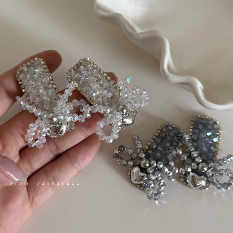 Pince à cheveux avec nœud en cristal de luxe léger pour femme, pince latérale de luxe pour célébrités d'internet, clip à frange polyvalent à la mode