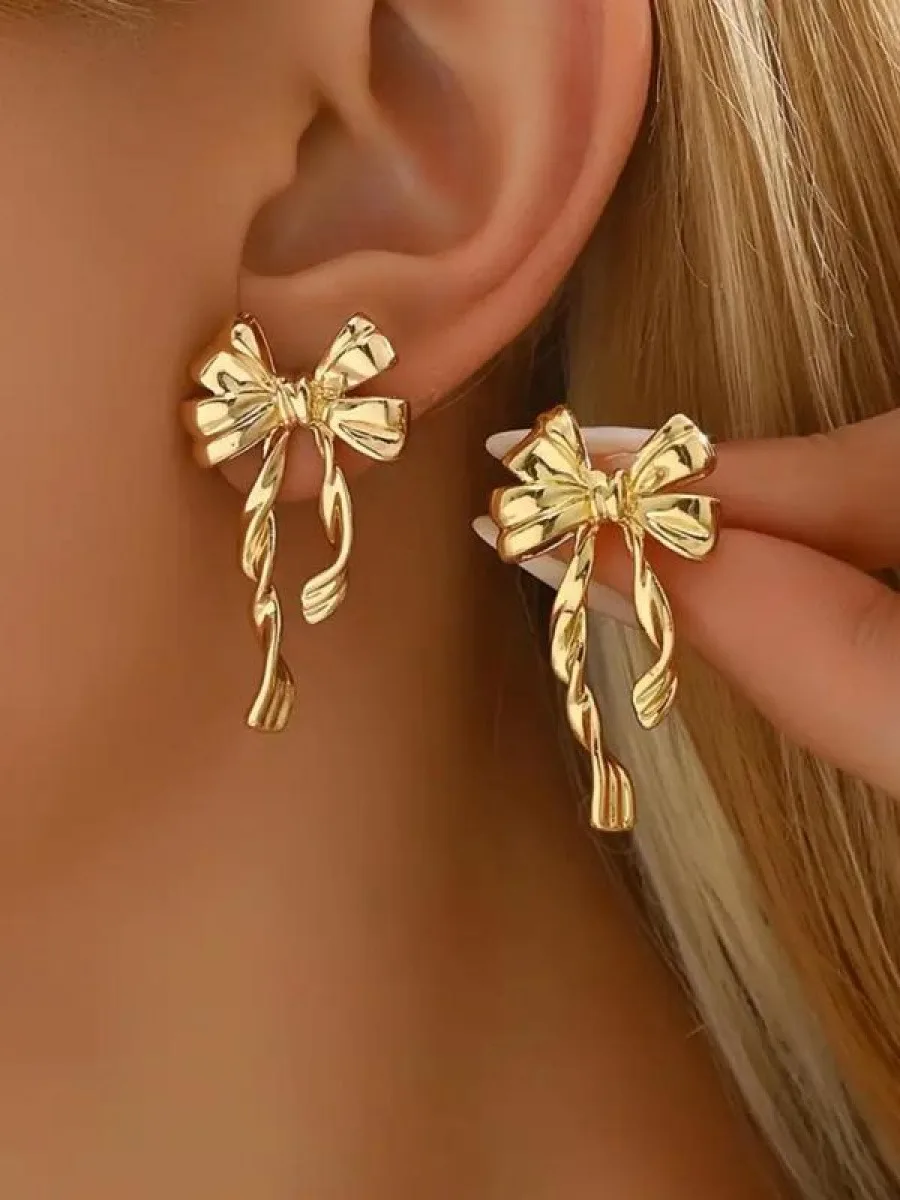 

Серьги-гвоздики с бантом, элегантные украшения для женщин, для вечеринок, повседневной одежды, модные универсальные и изысканные украшения для женщин.