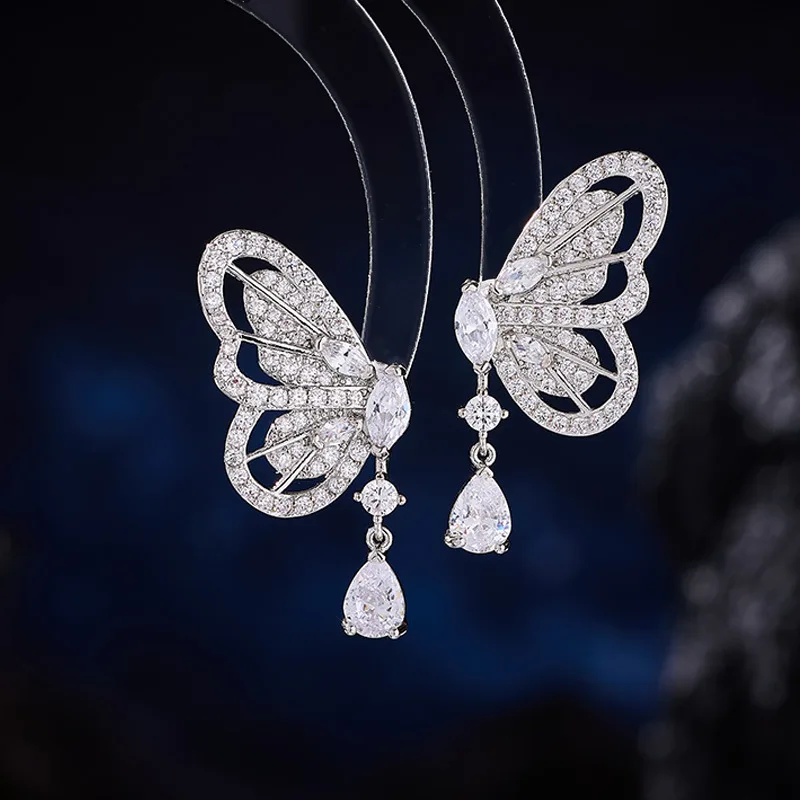 Модные и высококачественные серьги-гвоздики-бабочки с каплями воды и чрезвычайным эфирным и милым легким роскошным дизайном.