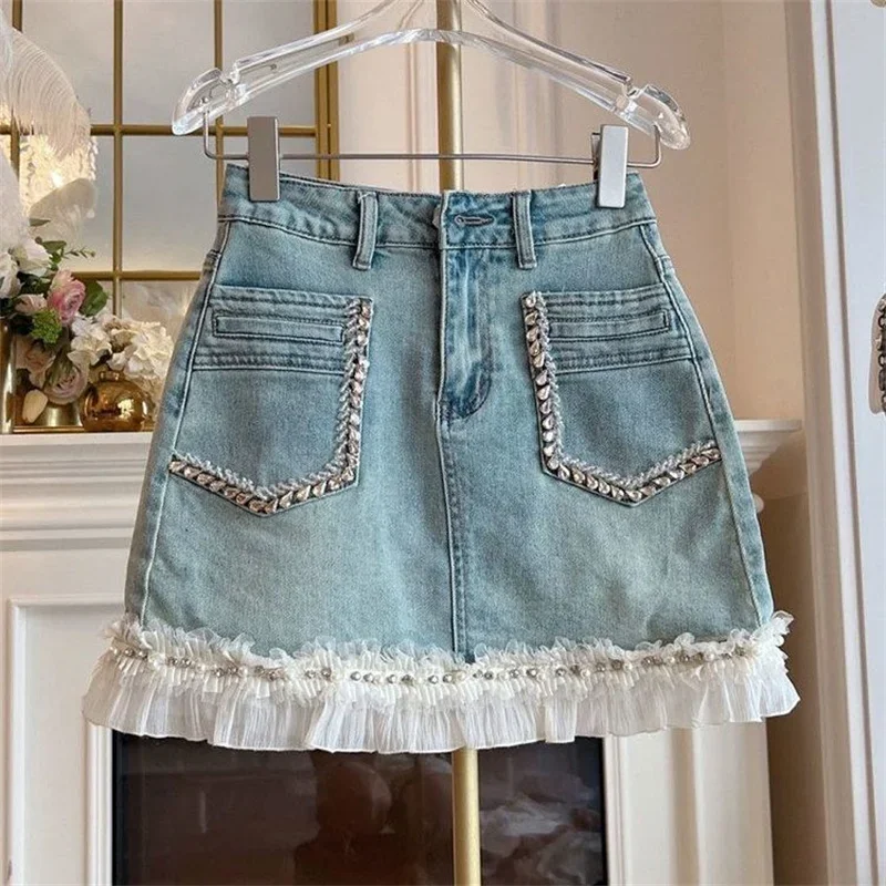 

Новая летняя кружевная лоскутная джинсовая юбка женская мода с бисером и рюшами и бриллиантами мини-юбки трапециевидной формы с высокой талией Jupe уличная одежда