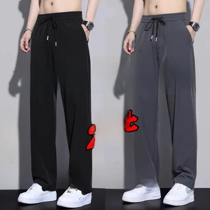 กางเกงลำลองผ้าไหมน้ำแข็งสำหรับผู้ชาย ฤดูร้อน เย็นสบาย แห้งเร็ว ทรงหลวม ไซส์ใหญ่ กางเกงใส่ในห้องแอร์ ชุดทำงาน สวมใส่สบาย ทรงขาตรง