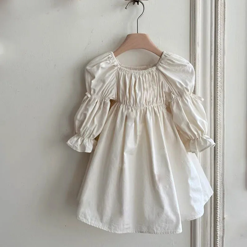 new Korean-style spring dress for parents  children  It features a solid color  elegant puffed-sleeve girl princess doll dress