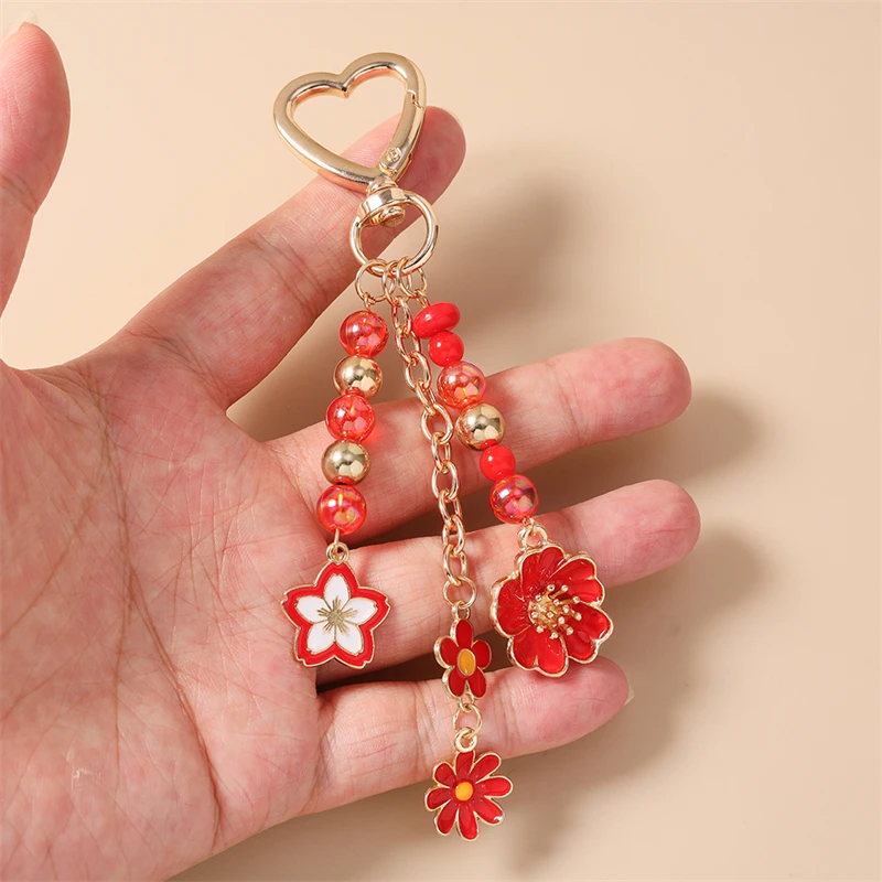 Modische Blumen-Schmetterling-Anhänger Schlüsselanhänger für Damen und Herren, Autoschlüsselhalter, Handtaschen-Schlüsselringe, DIY-Schmuckzubehör – Detail 2