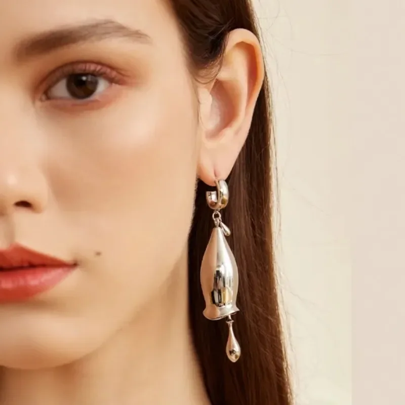 Gold and silver contrasting colors swinging bells earrings women's niche design earrings high-end trendy fashion temperament
