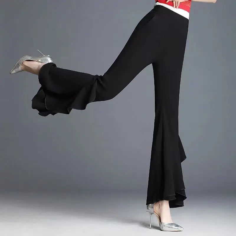 Primavera outono nova cor sólida moda cintura elástica bell-bottoms feminino high street cintura alta babados retalhos calças all-match