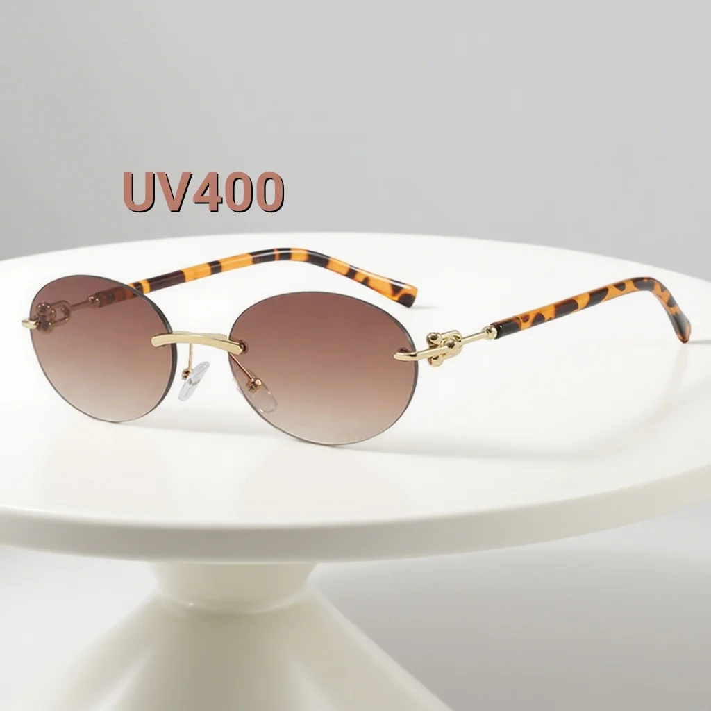 

2025 New Fashionable Frameless Cutting Edge Women's Sunglasses Retro Neutral Elliptical Frame UV400 Sunscreen Sunglasses