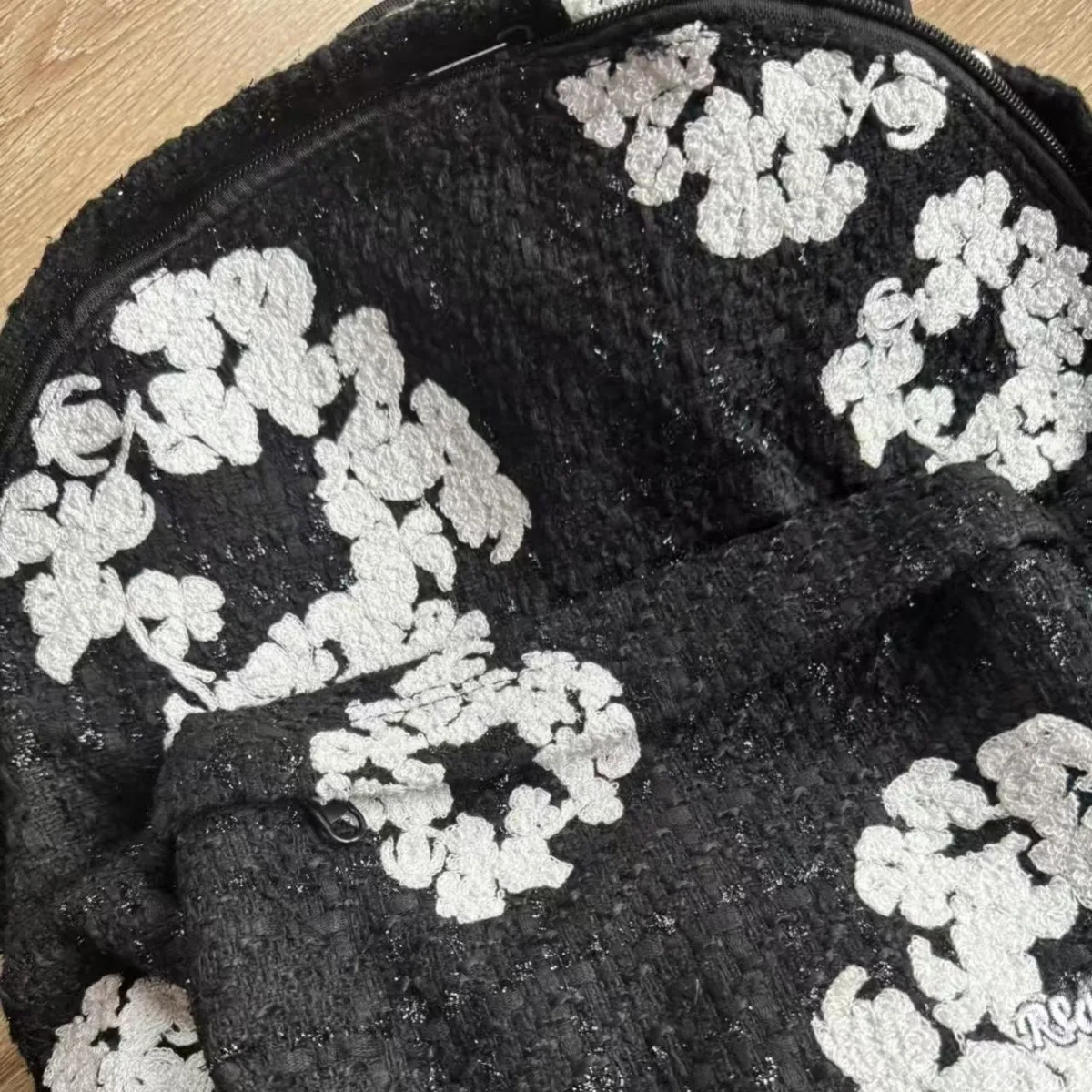 Xiaoxiangfeng design sense 10.000 aghi ricamati zaino a doppia spalla zaino casual per computer da uomo e da donna