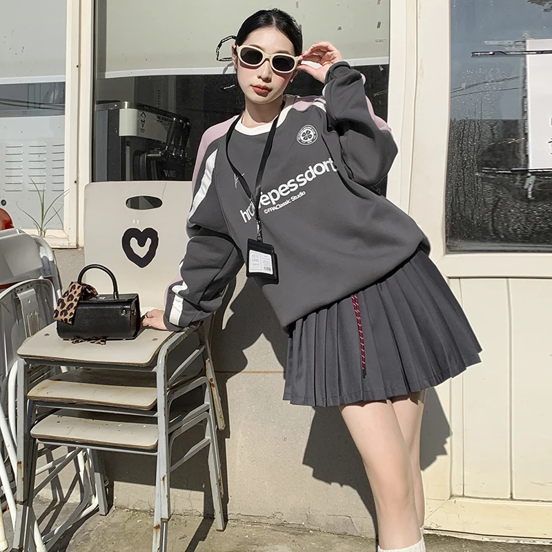 

Trendy casual loose-fitting couple's outfit with a round neck, elastic waist, and drawstring design, paired with a short skirt