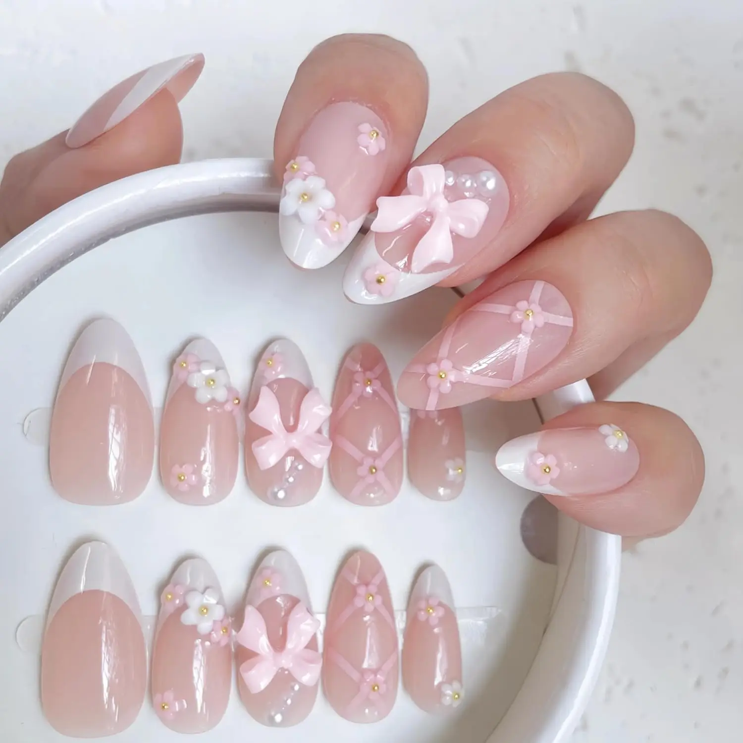 

Press-On Nails, 24pcs Blush Pink French Tip Almond with 3D Bows & Pearls, Medium Length Reusable Glue-On Nails Kit for Wedding