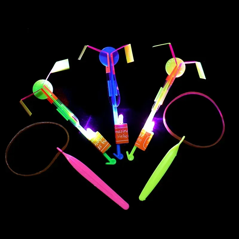 

Amazing Light Toy Arrow LED Light Toys Outdoor Party Fun Gift Rubber Band Helicopter Flying ToyCatapult Glow in The Dark Rocket