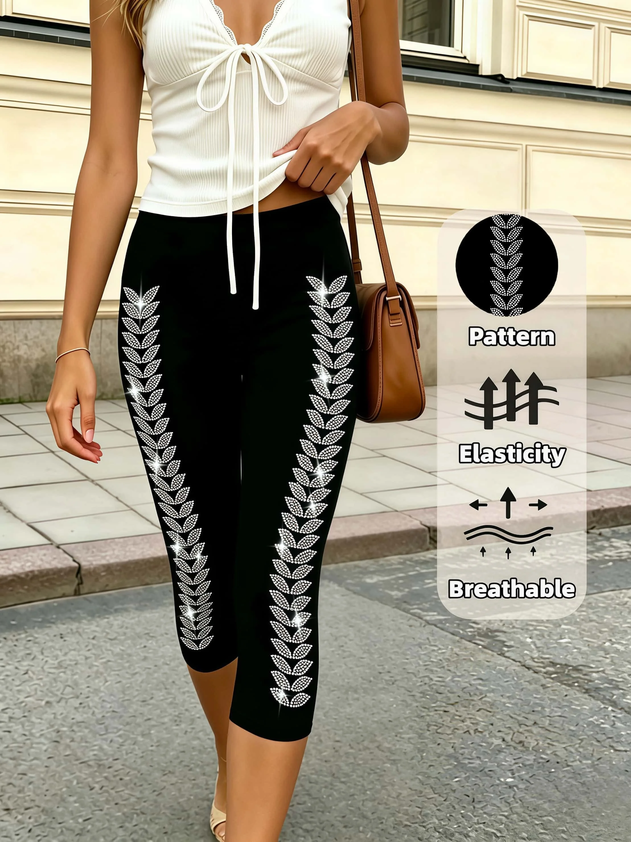 Schwarze Capri-Leggings für Damen mit seitlichen Blatt-Strass-Applikationen, dehnbar, atmungsaktiv, schmal geschnitten, kurze Yogahose, Streetwear