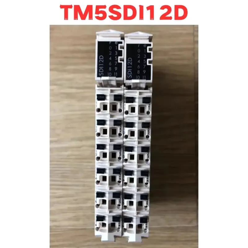 

Б/у TM5SDI12D PLC протестирован