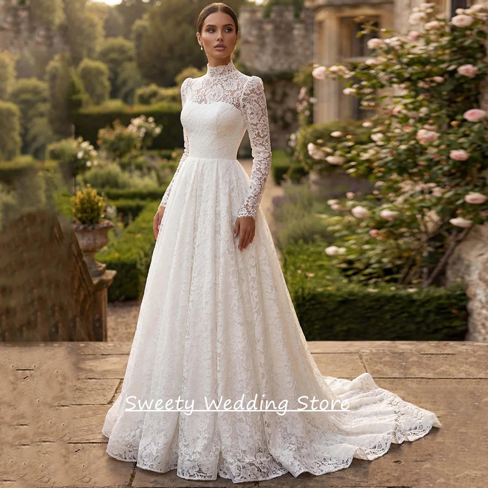 فستان زفاف عربي مخصص بأكمام طويلة ورقبة عالية دانتيل رائع سويب تراين فستان زفاف على شكل حرف A فيستدو دي نويفا