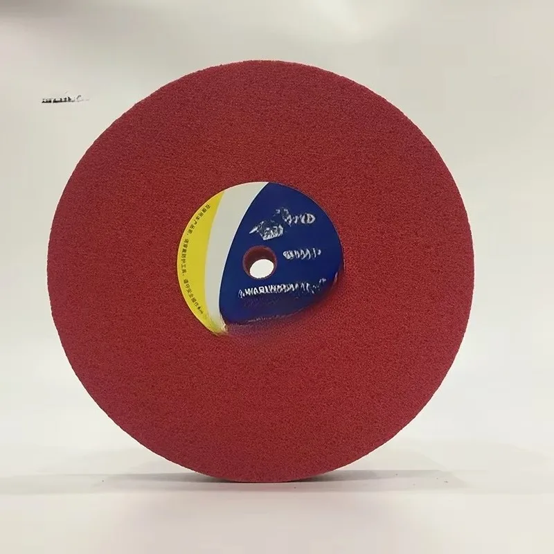

Red non-woven polishing wheel for cleaning and polishing surfaces and rust