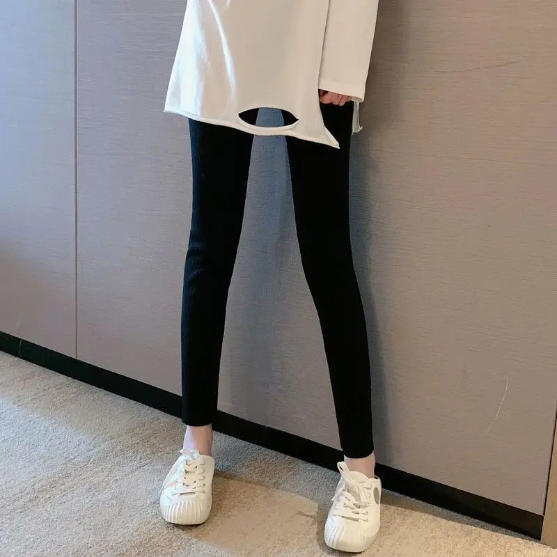 Leggings Flare femme pantalons printemps brillant noir dames grande taille Simple quotidien côtelé givré lavage à l'eau poches côté maille Ol