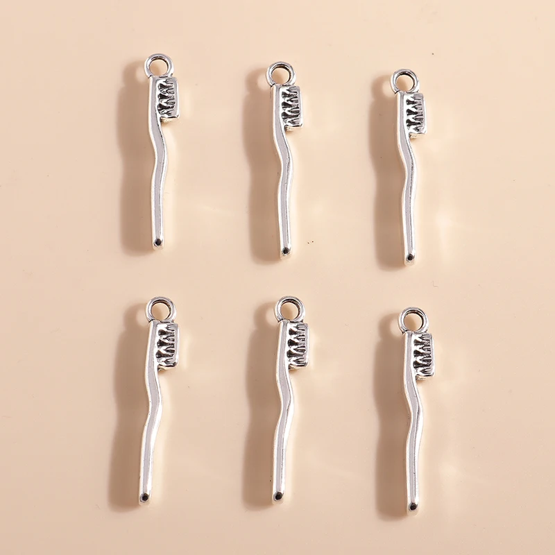 

Leslie 20pcs 5*29mm Alloy Silver Color Toothbrush Charms Jewelry Metal Pendant for DIY Necklace Bracelet Earrings Making