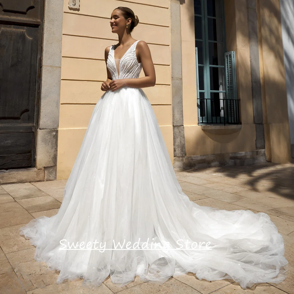 

Customized Glitter Wedding Dress Sexy Deep V Neck Sleeveless Open Back Sweep Train Pearls Bridal Gown for Woman Bride