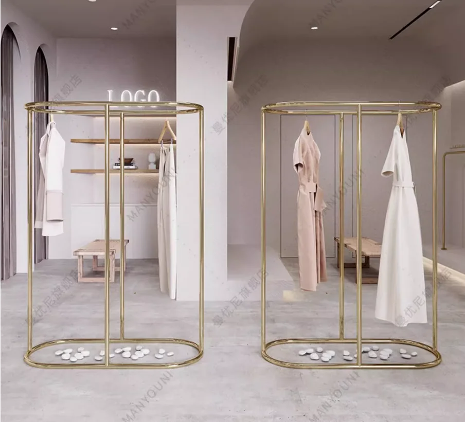 

Clothing store display rack, stainless steel and titanium double row hanging clothes display rack on the island of the store
