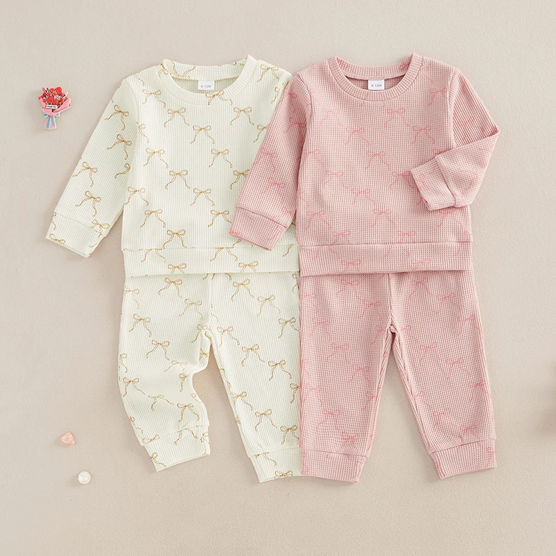 

2024-08-26 Lioraitiin Baby Girl Waffle Outfit, Bow Print Long Sleeve Pullover Sweatshirt Elastic Waist Pants with Pockets Set