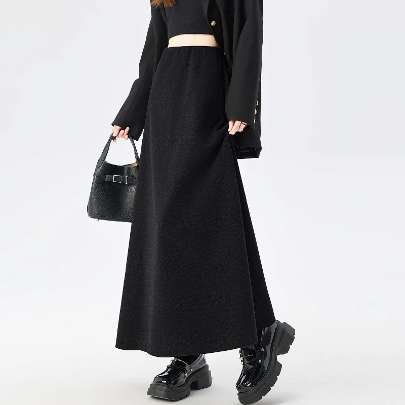 กระโปรงขนสัตว์คุณภาพสูงสำหรับผู้หญิง ฤดูใบไม้ร่วง ฤดูหนาว ดีไซน์หรูหรา ทรงเอ หนา สีดำ กระโปรงผู้หญิง เอวยางยืด ทรงตรง แฟลดาส 2025