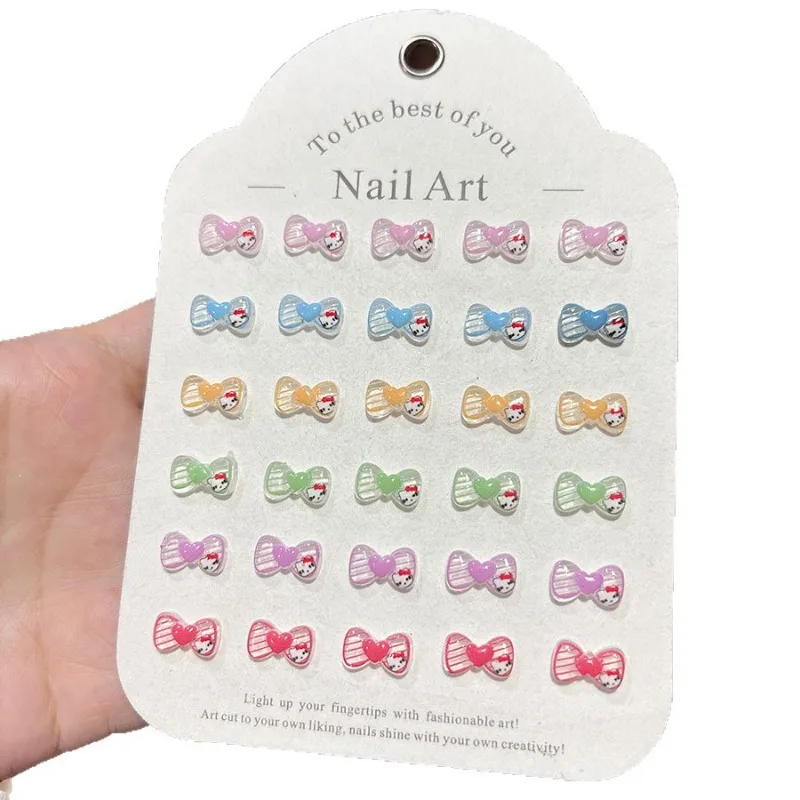 100 Stück/Packung 6,5 x 11 mm Hello Kitty Bow Nagel-Charms – kristallklare Harz-Herz-Nagelkunst, süße 3D-Nageldekoration für Kawaii-Maniküre