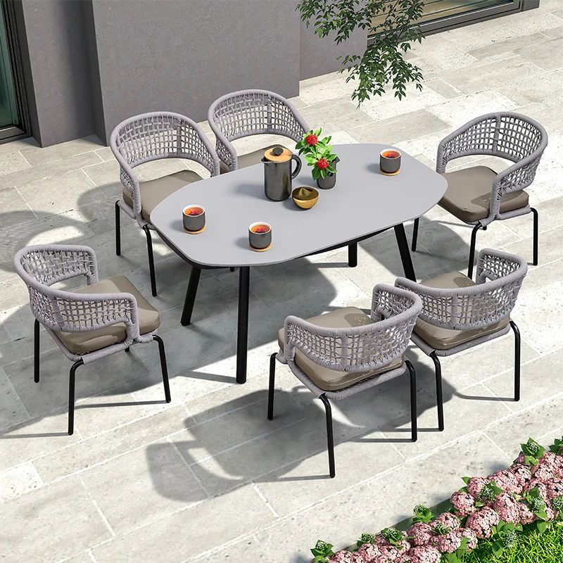 

Nordic outdoor table and chair combination outdoor courtyard rope woven leisure dining chair terrace designer garden dining chai