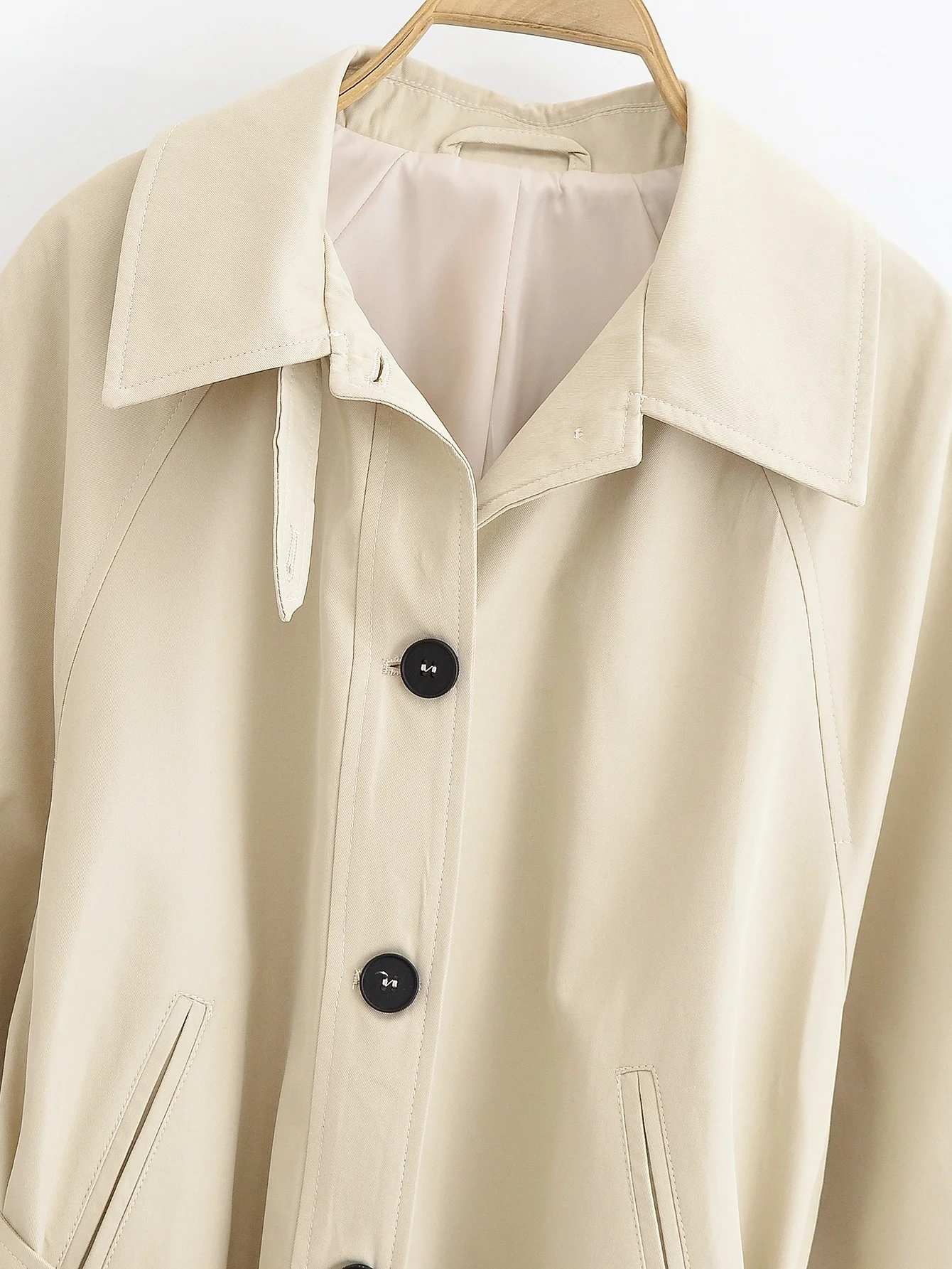 RARA2025 صيف جديد للمرأة عارضة أزياء بسيطة التنقل مع حزام طويلة الأكمام التلبيب سترة واقية قصيرة