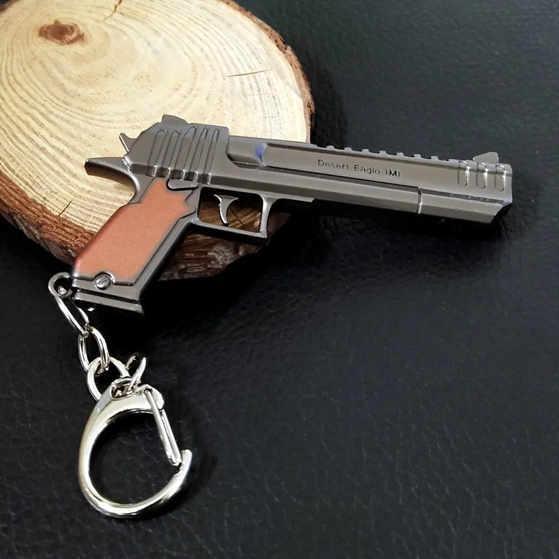 7.5cm/2.95in Peace Game Peripherals Bastion Mini Pistol Keychain Weapon Models Creative Backpack Pendant Boys Toys Gifts Crafts