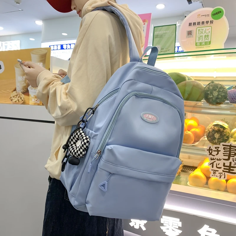 New Solid Color Waterproof Backpack Young Girls Korean Style Kawaii School Bag Shoulder Bag High School Students Nylon Backpacks