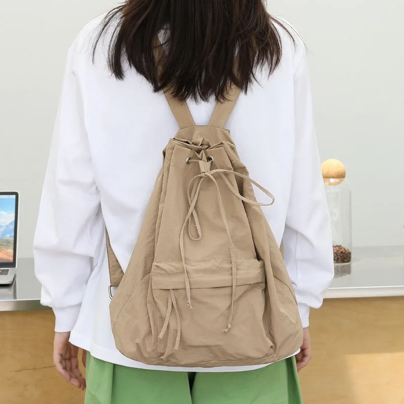 Korean Version of Nylon Cloth Backpack Female Students School Bag with Light Travel Draw Rope Bucket Bag Backpack Men