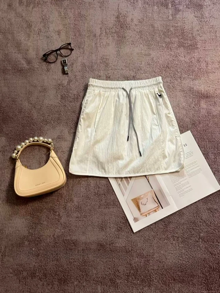 

Summer New Casual High Waist Drawstring Embroidery Short Skirt Design Sense Slimming Small Size Women's Fashion