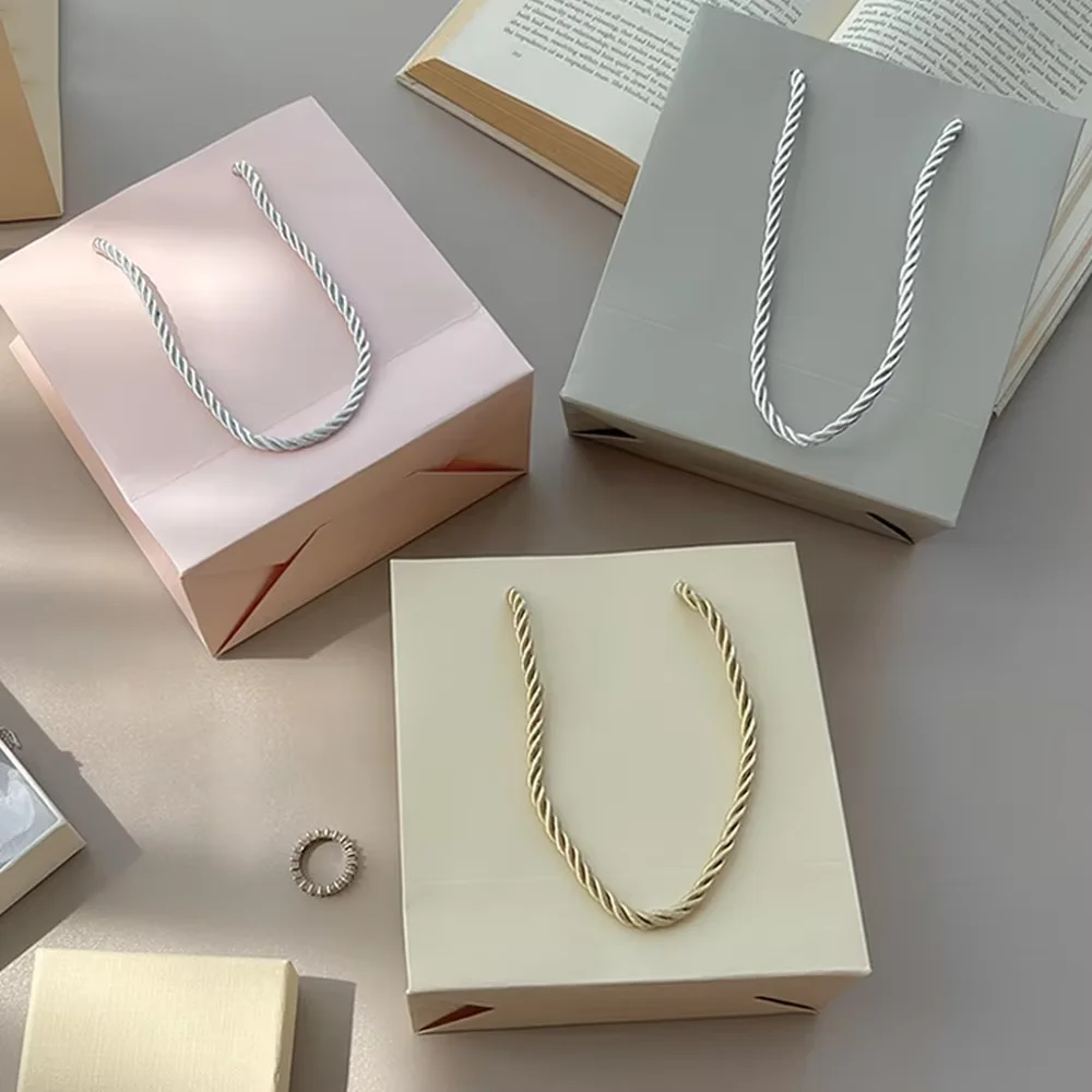 

100PCS Personalized Logo Jewelry Paper Bag 14x15x7cm Wedding Gift Packaging Men Game Organizer Shopping Travel Portable Pouches