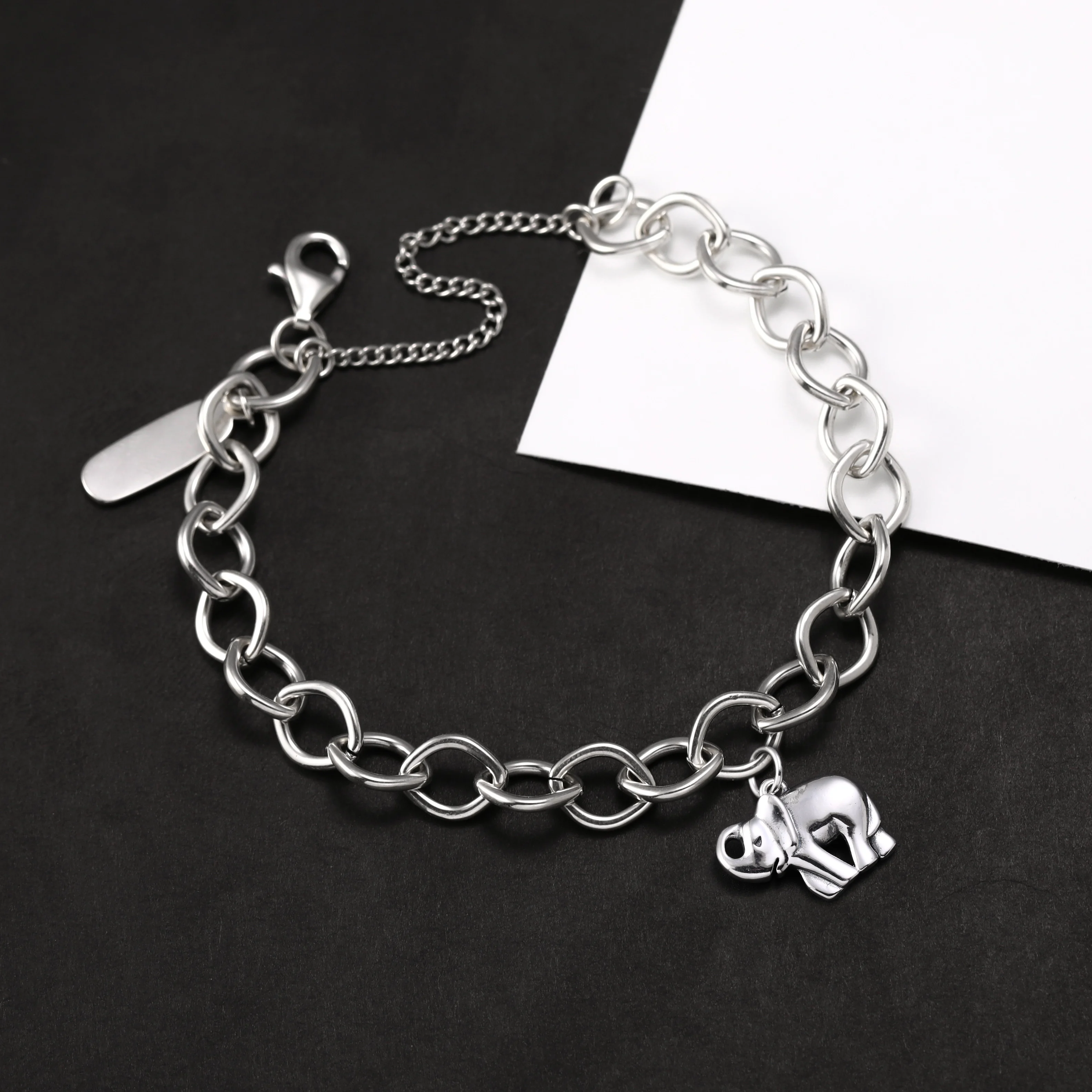 

Genuine 925 sterling silver Forged Link Charm Bracelet paired with an elephant pendant