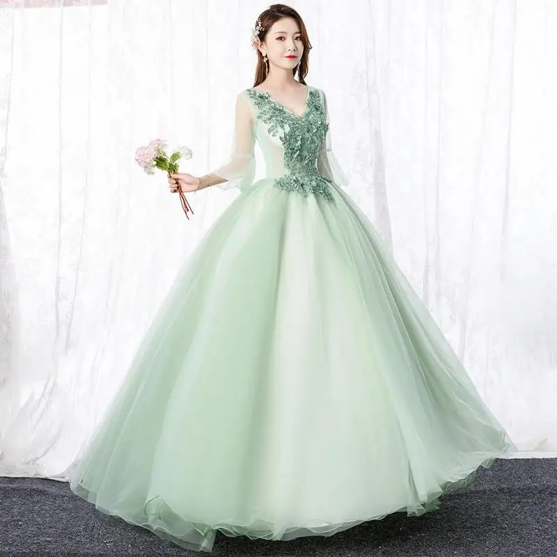 Novo três quartos mangas tule vestido de baile ilusão sexy profundo v-neck quinceanera vestidos de renda flores chão-comprimento vestidos de 15