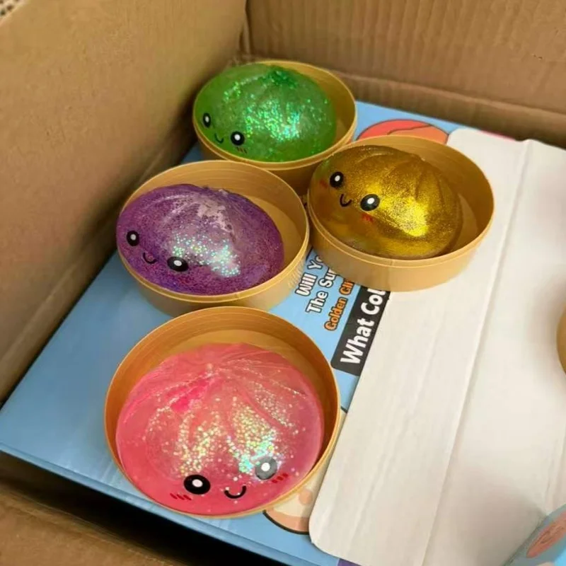 Glitzer-Dumpling-Squishy mit Box – Sensorisches Quetschspielzeug zur Stresslinderung, zufällige Farbe